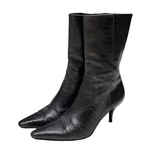 Black embossed snake skin black ankle boots.